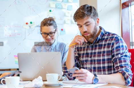 demo-attachment-127-people-working-in-office-P3DBYE3