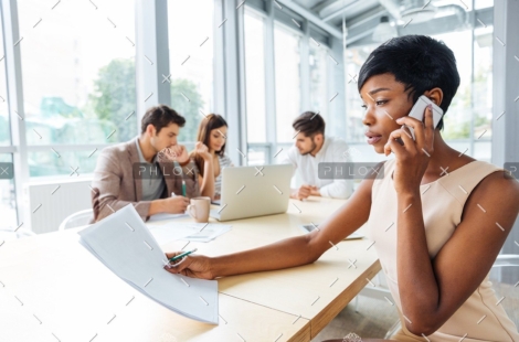 demo-attachment-133-serious-businesswoman-with-documents-talking-on-P9Q6LX6